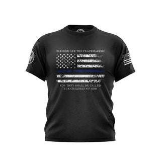 "Black T-shirt featuring 'Blessed are the peacemakers' text with patriotic graphics."