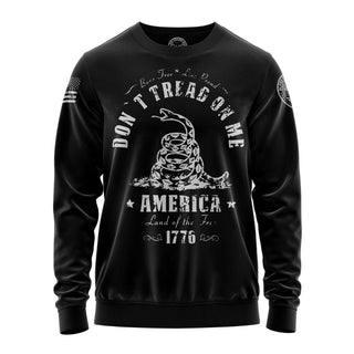 "Sweatshirt featuring 'Don't tread On me America 1976' inspirational text and patriotic graphic design."