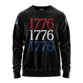 "Sweatshirt featuring '1776 In Red White and Blue' inspirational text and patriotic graphic design."