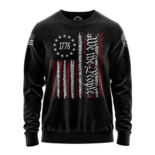 "Sweatshirt featuring '1776 We the People' inspirational text and patriotic graphic design With US colorful flag."