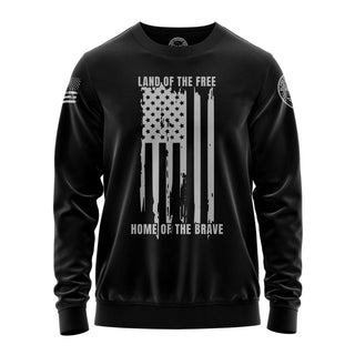 "Sweatshirt featuring 'Land Of The Free Home Of The Brave' inspirational text and patriotic graphic design."