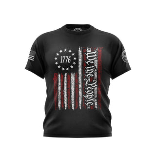 "Black T-shirt featuring 'We The People' text with patriotic graphics." 