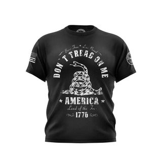 "Black T-shirt featuring 'Don't Tread On Me' text with patriotic graphics."